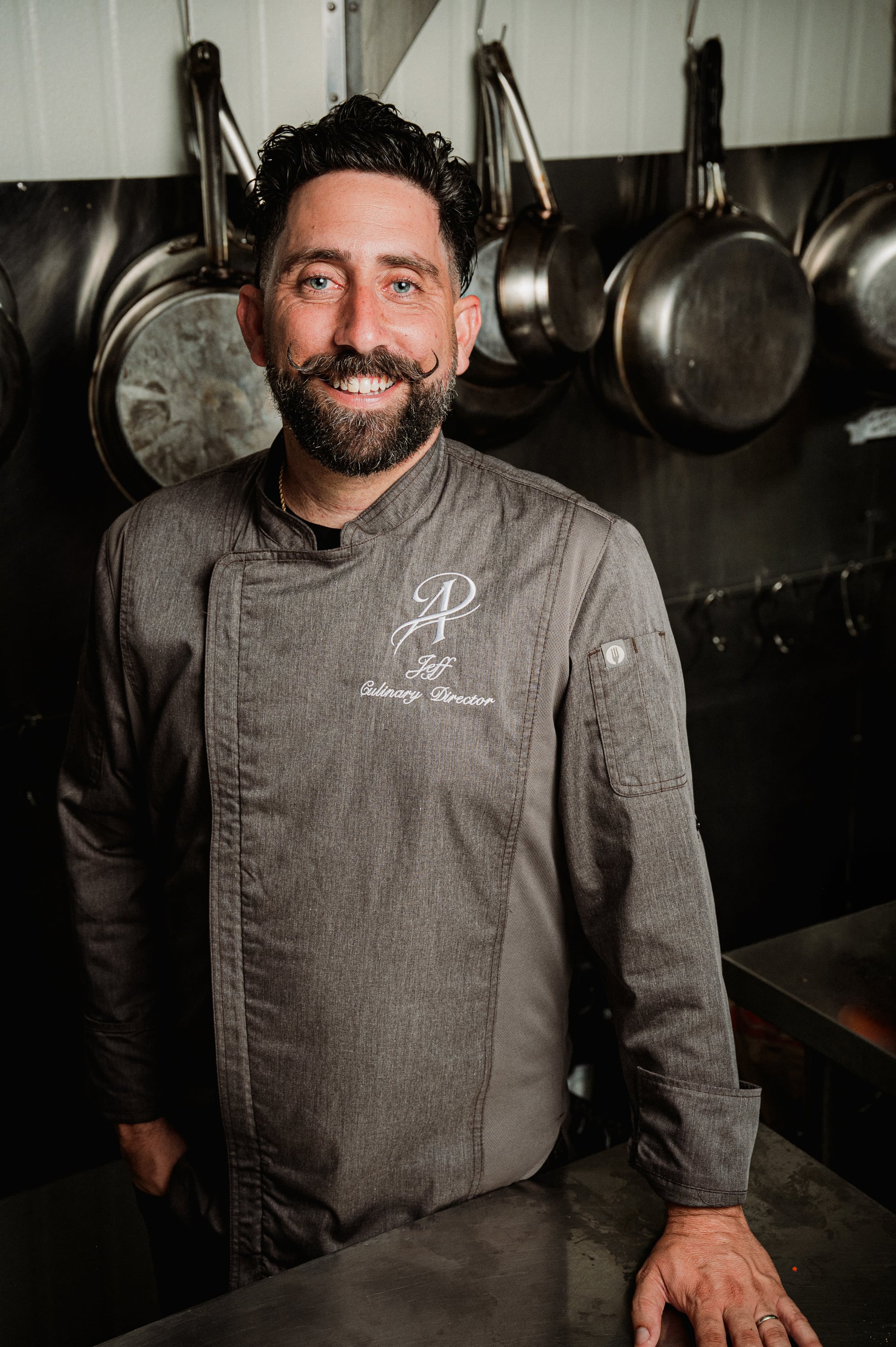 Side profile portrait of Chef Jeff Ardi